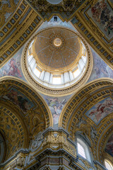Fototapeta na wymiar Rome/Italy - March 20 2019: Dome of Sant'Ambrogio e Carlo al Corso basilica