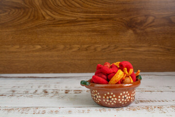 Mexican snack with spicy peanuts and salty potatoes