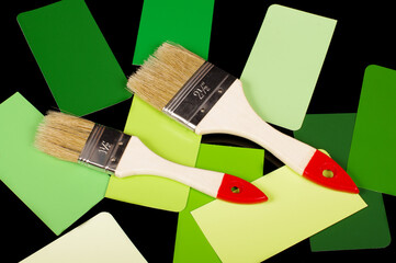 Paintbrush and colour sample cards