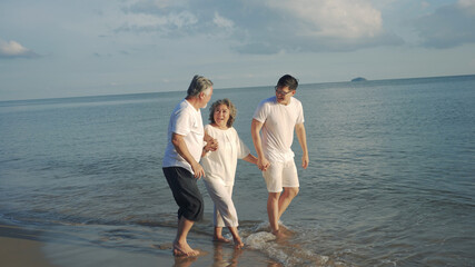 Happiness Asian family son and couple senior elderly retirement resting travel