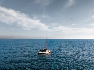 Sailboat in The Ocean Water
