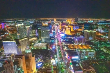 Gartenposter LAS VEGAS, NV - JUNE 29, 2018: Night aerial view of Casinos and Hotels along The Strip. This is the famous city road full of Casinos and Hotels © jovannig
