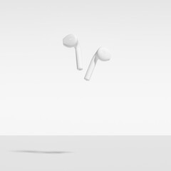 Wireless In Ear Headphones Isolated On White Background. Abstract Image of White Painted earphones, Falling, Floating, Suspended, Isolated Against White. 3d Rendering.