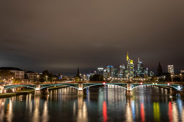 The Skyline of Frankfurt from the Ignatz-Bubis-Bridge at night.