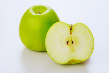 Green juicy apples isolated on white background.