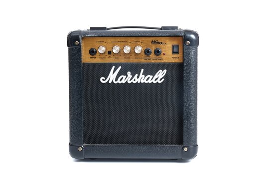 Small guitar combo amplifier isolated on white background