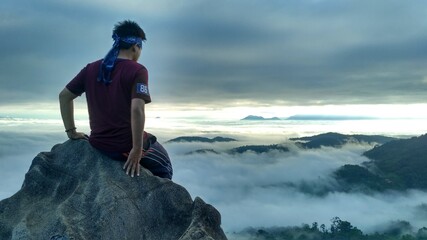 person on the top of mountain