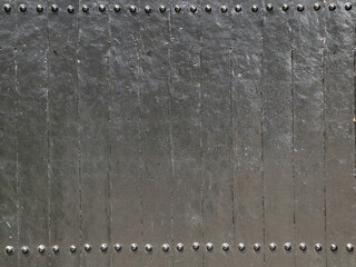 Glossy chrome metal texture with rivets