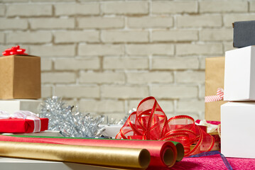 DIY Gift Wrapping station. Beautiful christmas gifts Christmas wrapping station concept side view...