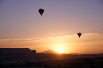 Hot air balloons at sunset in Cappadocia, Turkey