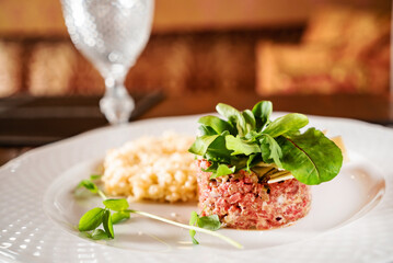 beef tartar on the white plate