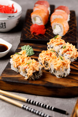 Still life with appetizing rolls. Japanese food concept. Close-up.