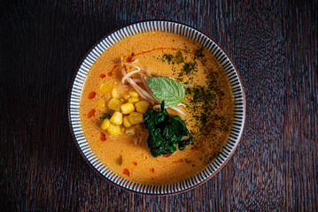 asian soup on wooden background