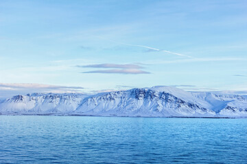 Iceland's snow-capped mountains and ocean