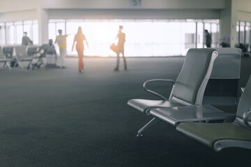 Fototapeta premium Empty airport terminal waiting area with chairs