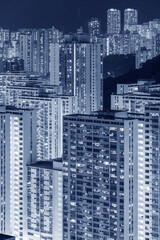 Crowded residential buildings in Hong Kong city at night