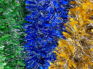 Multicolored curling stream paper isolated on white background