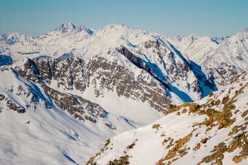 Mountains covered with snow in Solden ski area on beautiful sunny winter day, Tirol, Austria