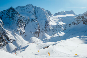 Mountains covered with snow in Solden ski area on beautiful sunny winter day, Tirol, Austria