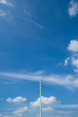 Obraz premium Cloudy blue clear sky with cable wire stand pole