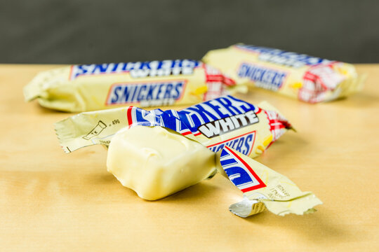 Niedomice, Poland - June 08, 2018: Open package of snickers in white chocolate - limited edition.
