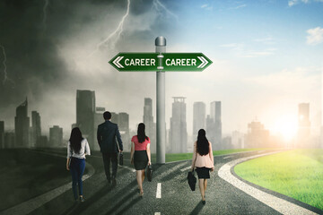 Businesswoman walking toward bright city