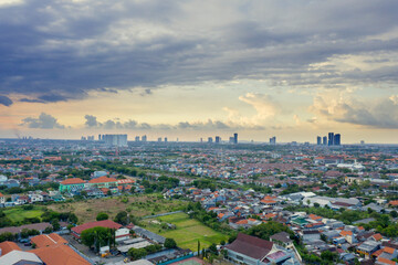 Dense residential houses with cloudy sky