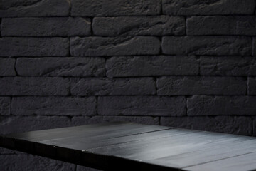 Old brick wall background. Grunge texture. Black wallpaper. Dark surface