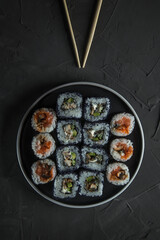sushi set on a beautiful plate, top view