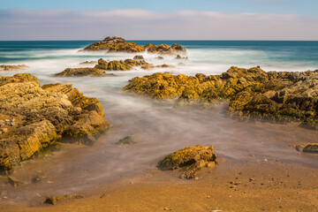 Long exposure image of the rocky coast in northern Chile