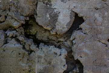 The texture of a stone wall, flooring, concrete destruction, metal corrosion and rusty antiquity, the basis of construction reinforcement and ceilings, paint chips