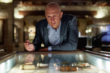 Portrait of a man visiting museum or gallery