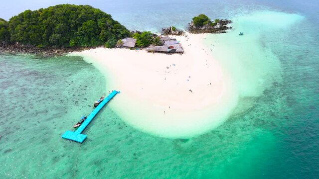 Aerial view of drone, Scene of Beautiful nature Top view of White beach sand in summer day, Seawater clear and blue green. Nature in Khai Now and Khai Maew Iland. At Khai Maw island, Phuket, Thailand.