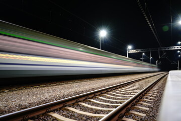 Train passing through the station at night