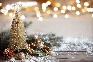Christmas cozy background with decor details, snow and blurry lights copy space.