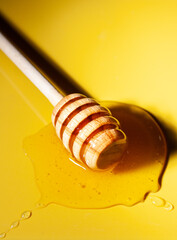 honey dripping from a dipper