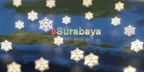 Snowy weather icons near Surabaya city on the map, weather forecast related 3D rendering