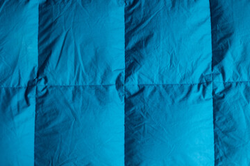 quilted duvet texture of green and blue color