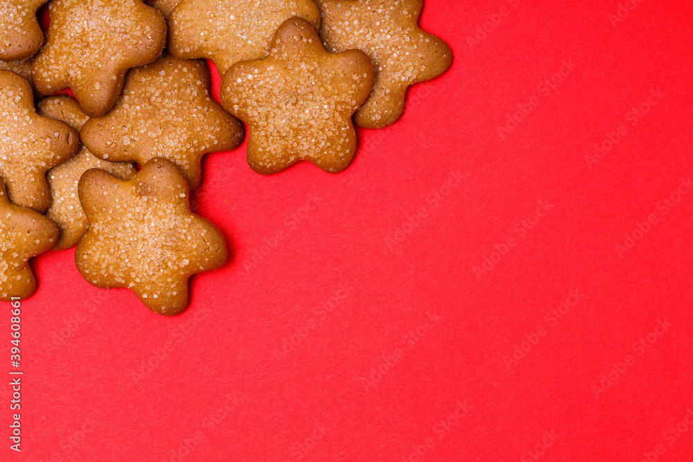 Poster cookies in the shape of stars on a red background