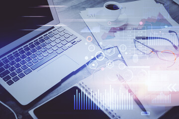 Double exposure of table with computer on background and data theme drawing. Concept of innovation.