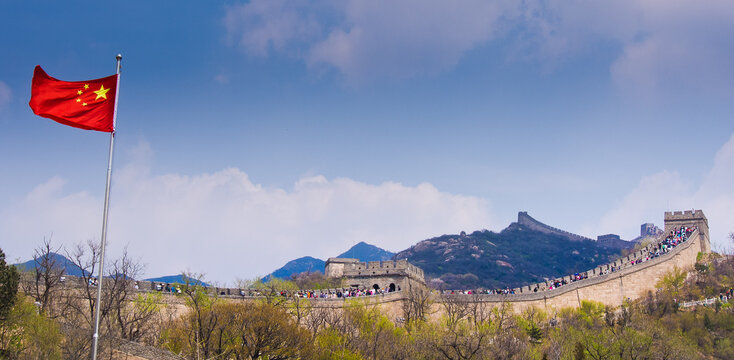 Flag By Great Wall Of China Against Sky