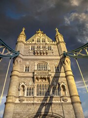 Fototapeta na wymiar London England, detail of the front of Tower bridge under impressive sky