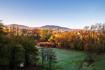 Trinec town with Maly Javorovy and Ostry hills on the background in Czech republic during autumn morning