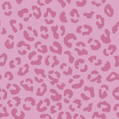 Leopard seamless pattern. Vector animal print. Bright pink spots on a pale pink background. Jaguar, leopard, cheetah, panther fur. Leopard skin imitation can be painted on clothes, paper or fabric.