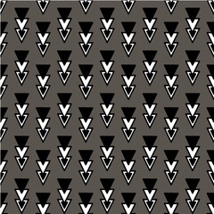 . Vector seamless pattern with triangles
