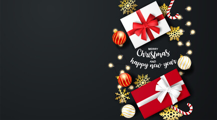 Happy new year and Merry Christmas. Design with gift box and gold snowflakes on black background .vector. illustration.