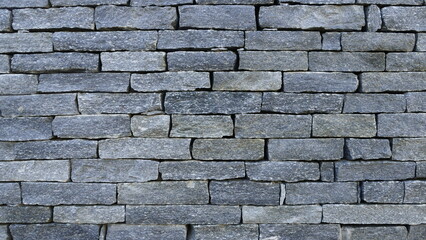 Grey brick wall - rubble stone texture