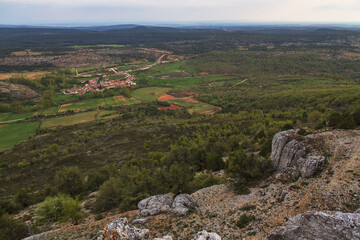 Fototapeta na wymiar Mountain top with village in the background below