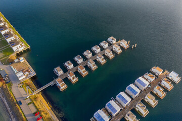 Top down aerial view of holiday paradise Baltic Sea resort with floating holiday houses  at Baltic...