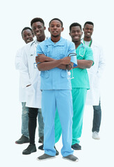 in full growth. smiling young doctors standing one by one